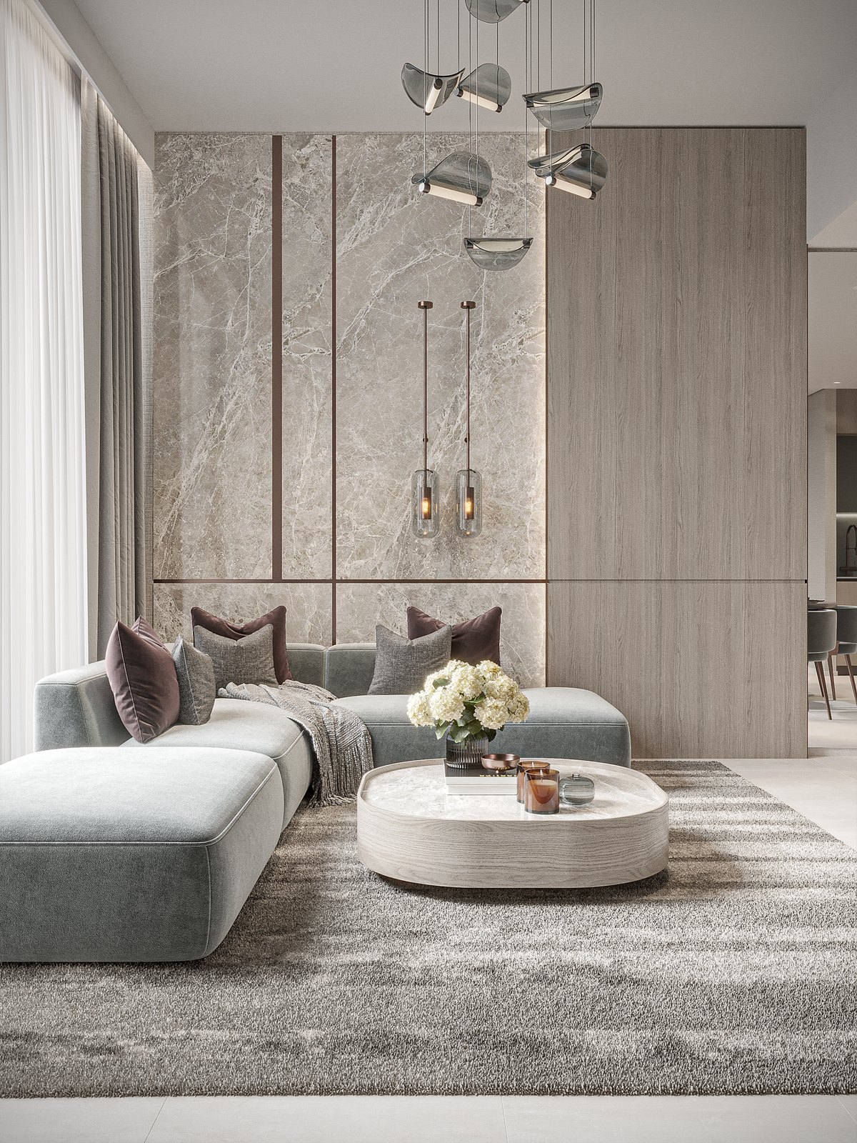 Floareá Breeze: a living room, book-matched marble with bronze lines beside timber panelling