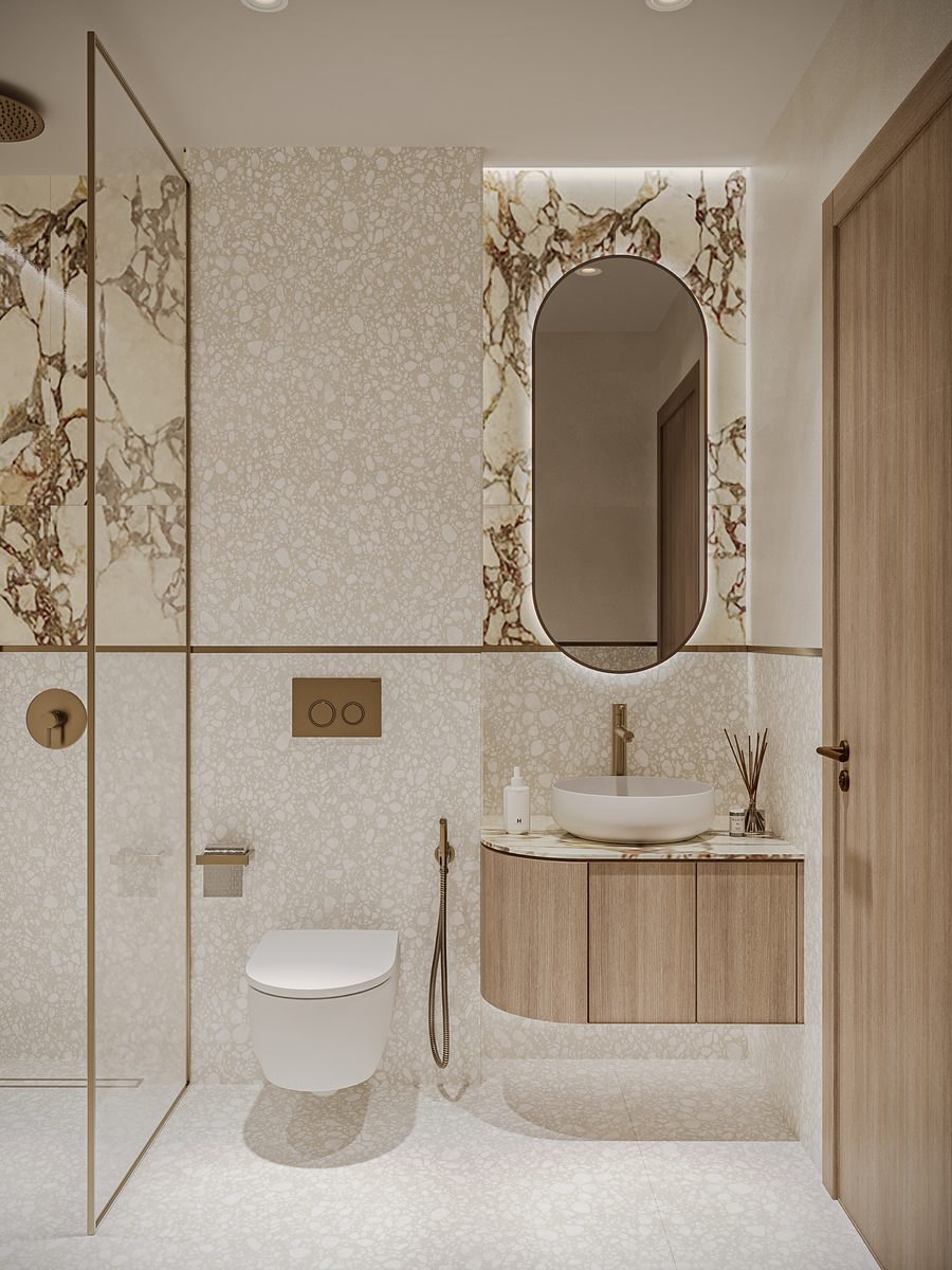 Floareá Residence: a bathroom as handed over, stone walls and brass fittings